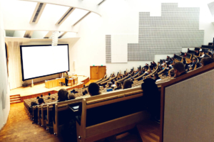 Students sitting in a lecture hall.